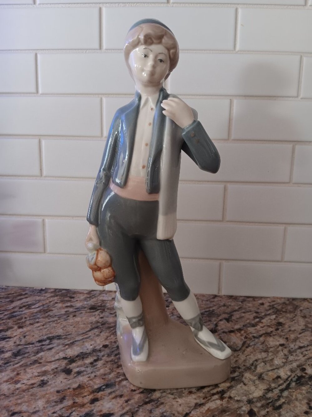 REX Valencia porcelain boy figurine